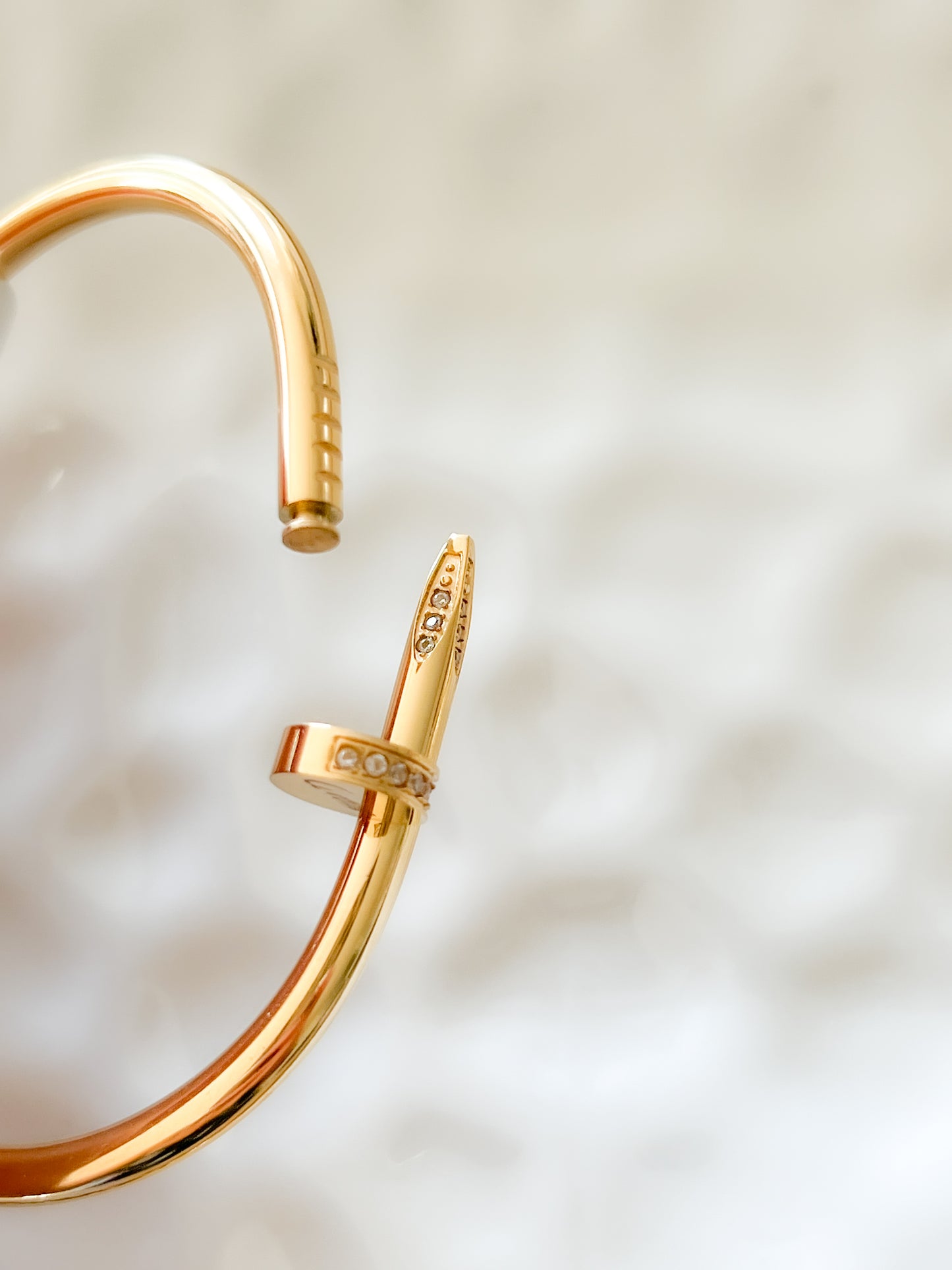 Nail bangle with diamonds