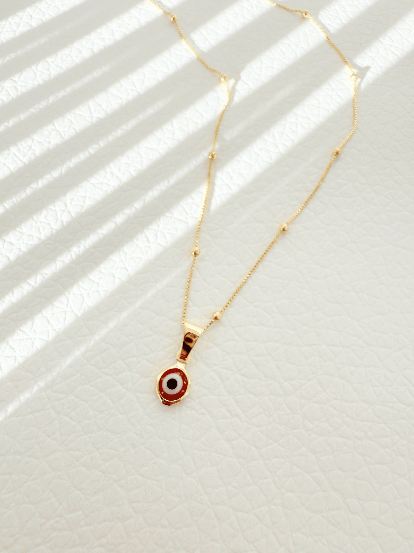 Tiny Evil eye - Jewelry Maktub LLC