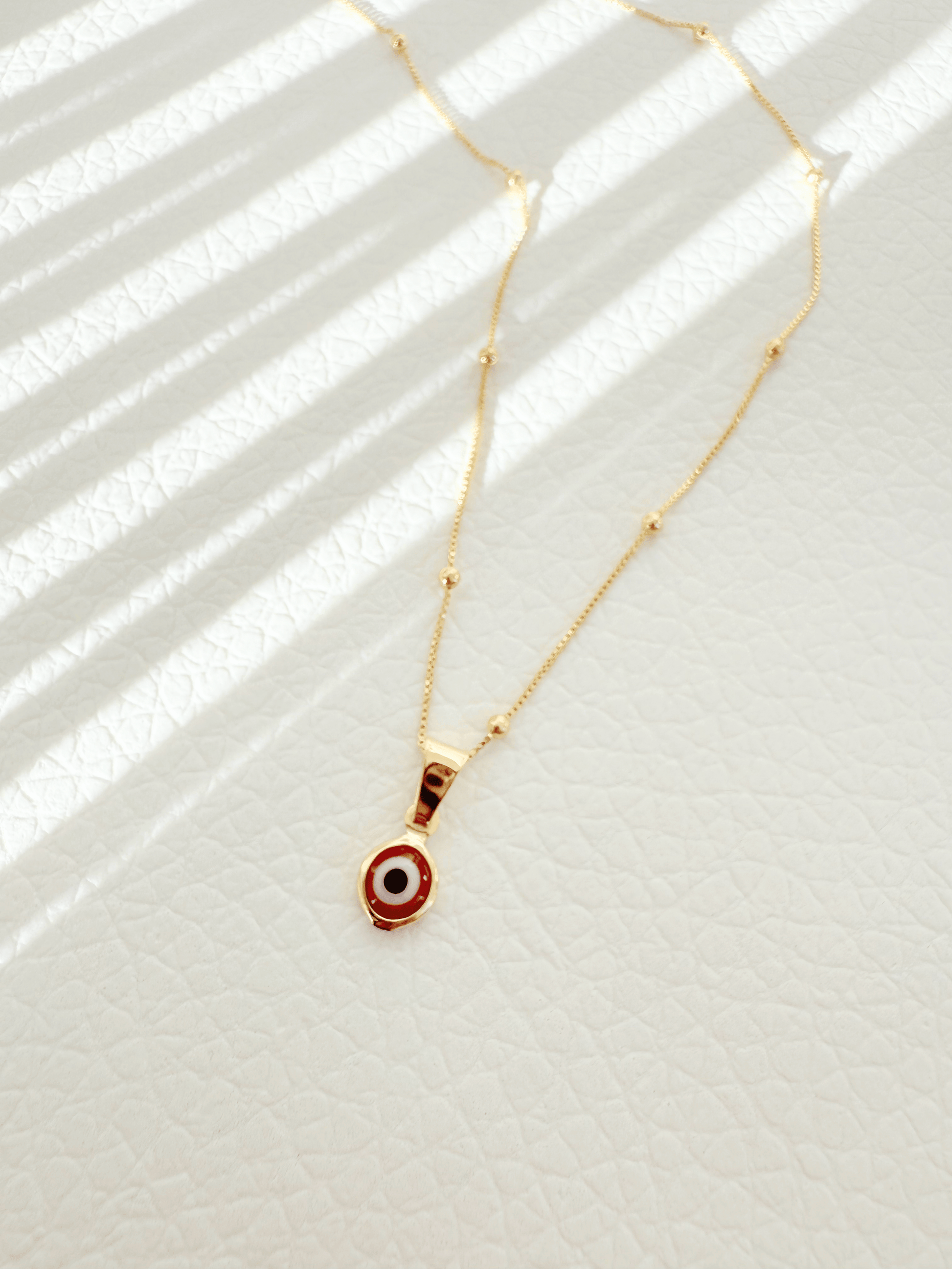 Tiny Evil eye - Jewelry Maktub LLC